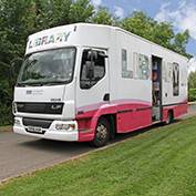 The mobile library in East Hatley, Cambridgeshire on 19th June 2018. The service is provided by Cambridgeshire County Council and comes to East Hatley on the third Tuesday of each month, from 11.10 to 11.30 am.