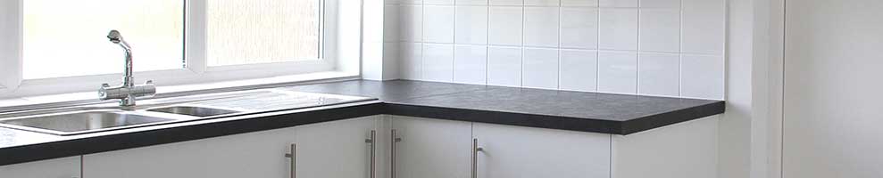 Part of the new kitchen in Hatley Village Hall after it was updated in March 2016 – with plenty of clean surfaces, new tap and stainless steel sink.