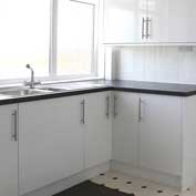 Part of the new kitchen in Hatley Village Hall after it was updated in March 2016 – with plenty of clean surfaces, new tap and stainless steel sink.