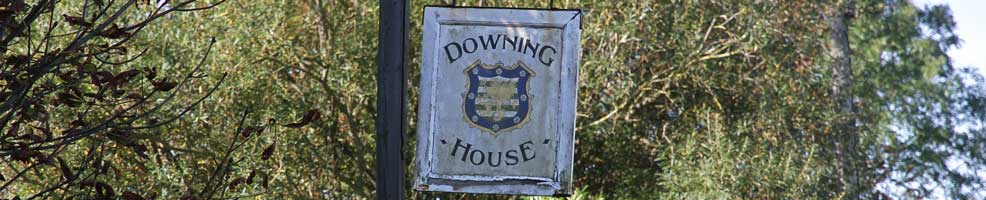 The sign for Downing House – originally 'The Downing Arms' but better known as 'The Scratching Cat' – on Lower Road, Croydon, Cambridgeshire. It closed in 1995 and is now a private residence.