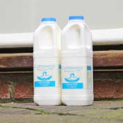 Doorstep milk delivered by the Hatley shop and post office.