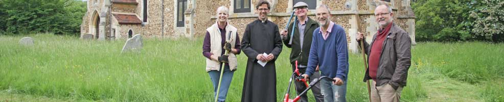 St Denis' church East Hatley, Cambridgeshire – blessing of the new mower. Under the churchyard management plan, the grass is allowed to grow very long – the Alco scythe (or scissor) mower makes cutting long grass relatively easy. Pictured left to right are Sarah Brennan, Reverend Steven Rothwell, John O'Sullivan, Peter Mann and Michael Pearson – 9-6-13. Photo: Philippa Pearson.