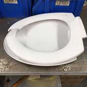 Found in a blue wheelie bin [5] – a-toilet seat. Only things which can be recycled easily (so not hard plastics) should be put into your blue bin. SCDC has a list on its website.