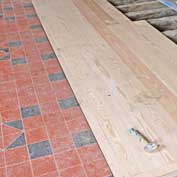 St Denis' church, East Hatley – work in progress during the first phase of the FoFC's restoration project, April 2018.  This is the new floor tiling and boards in the nave.