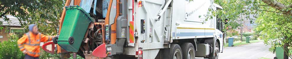 SCDC bin lorry on its regular Wednesday round to Hatley. South Cambridgeshire District Council normally empties black bins one Wednesday, green and blue bins the next.