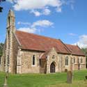 St Denis' church East Hatley, Cambridgeshire from the south west. The Friends of Friendless Churches has completed two phases of restoration work since taking ownership of the building in 2016 – including (in 2018) new windows in the mediaeval nave and (in 2021) new windows in the chancel William Butterfield built in 1874.