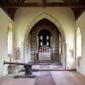 In spring 2022, the Friends of Friendless Churches removed the very crumbly 150 year old plaster in the nave , replastered it with the correct lime putty mix, then lime washed it with a half tone blend of the pigments from the original 'cream' and 'conch' colours.  St Denis' is now every day from 8.30 am to dusk.  Photo: Peter Mann / Buzz Associates.