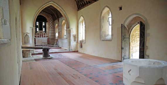 The south wall in the nave and chancel of St Denis' church, East Hatley. In 2022 the walls in the nave were replastered. St Denis' is now every day from 8.30 am to dusk. Photo: Peter Mann / Buzz Associates.