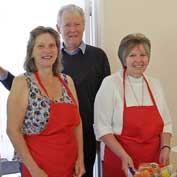 Mervyn co-founded the Hatley Coffee Morning with Linda Hudson (left) – here they are with Ann Hooley and Sofie Hooper (right), its first customer, on 4th October 2016 – from memories of Hatley, by Mervyn Lack, July 2022. Photo: Peter Mann.